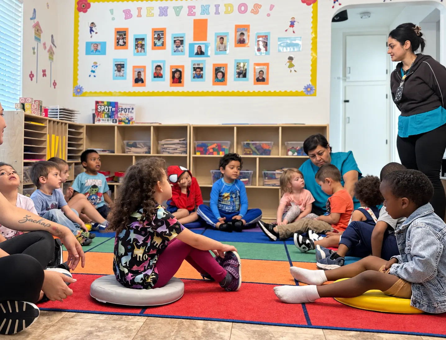 Toddlers learning together during circle time at Santa's Little Cloud
